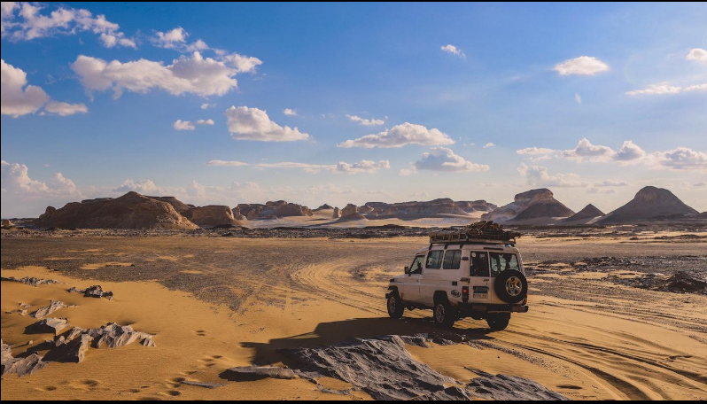 4x4 jeep exploring the Black Desert on an Egypt desert safari adventure